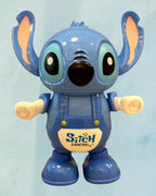 Tagerelsa3ada blue dancing character toy with flashing lights and 'Stitch Dancing' logo on overalls.