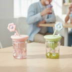 Tagerelsa3ada colourful flower tumbler with straw, available in pink, green, and blue. Perfect for kids.