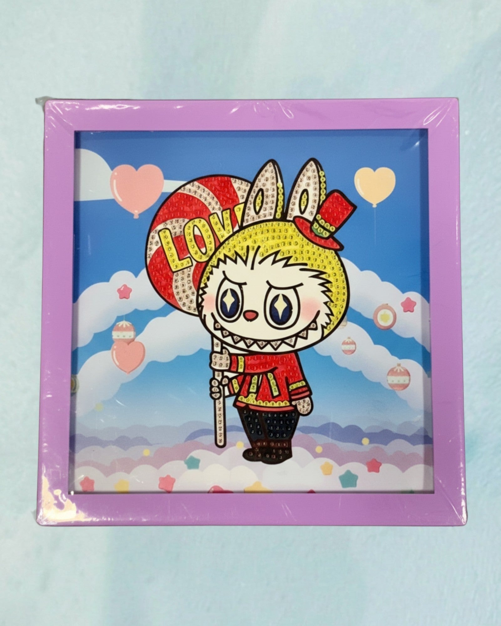 Tagerelsa3ada cartoon bunny diamond painting kit with frame, featuring a character holding a lollipop with the word LOVE.