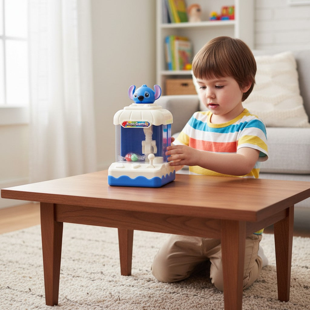 Tagerelsa3ada blue and white kids game claw machine toy with a Stitch character on top, featuring a joystick and buttons.