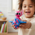 Tagerelsa3ada pink character in blue airplane toy with yellow accents on wings. Plastic construction, ideal for imaginative play.