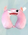 Tagerelsa3ada pink plush character travel neck pillow with embroidered face and ears, perfect for comfortable journeys.