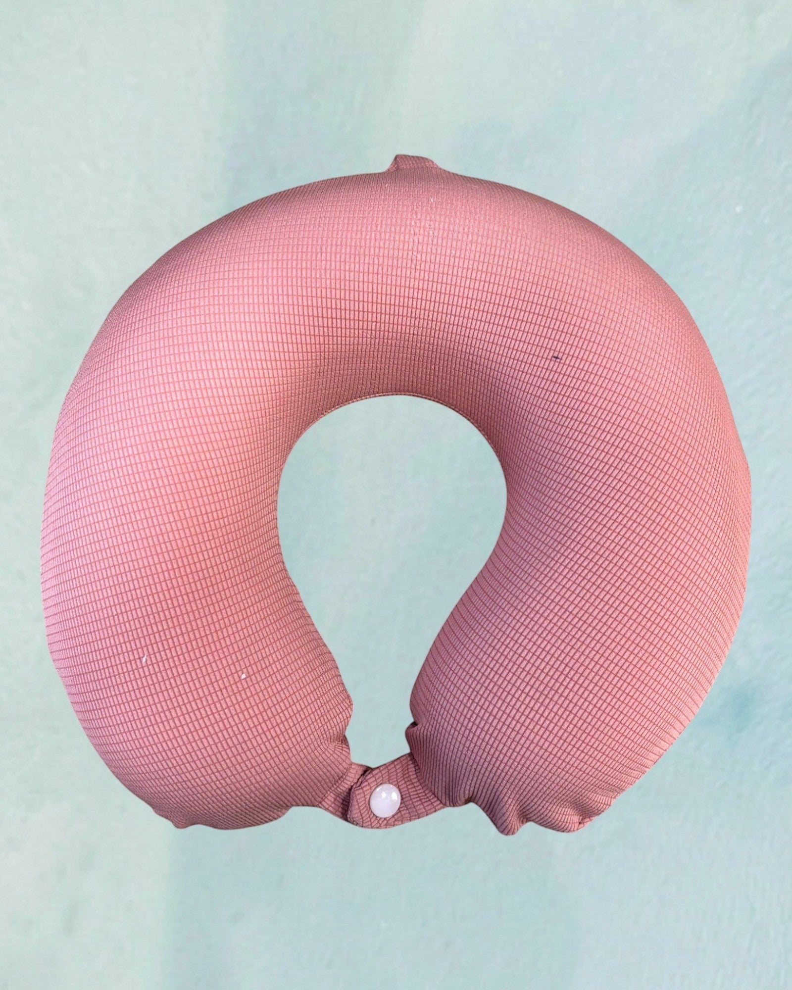 Tagerelsa3ada pink travel neck pillow with snap closure, textured fabric for comfortable support