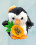 Tagerelsa3ada plush penguin toy with fuzzy black and white fur, orange beak and feet, holding a pineapple slice with bread.