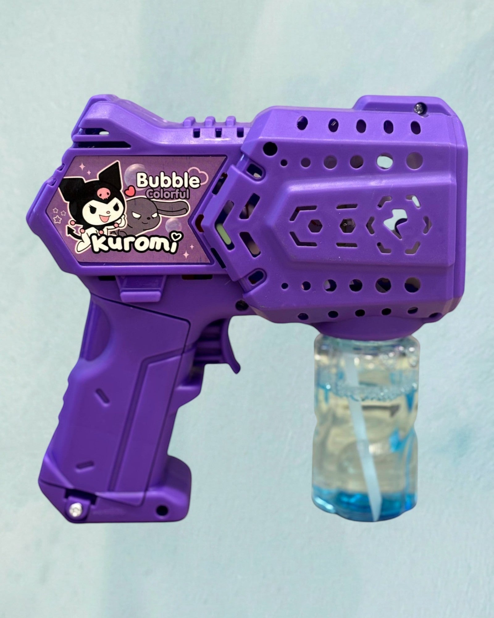 Tagerelsa3ada purple automatic bubble gun toy with Kuromi character sticker, includes bubble solution.