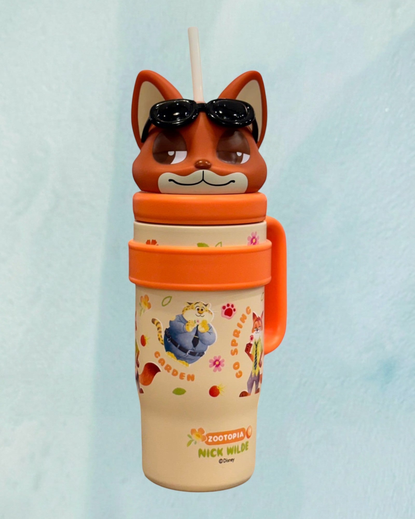 Tagerelsa3ada Zootopia Nick Wilde tumbler with straw and handle, featuring cartoon characters and a fox design with sunglasses.